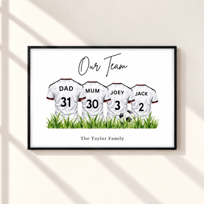 Personalised Fulham inspired family football print with four white football shirts, custom names and numbers, Our Team heading and Taylor Family wording in black frame