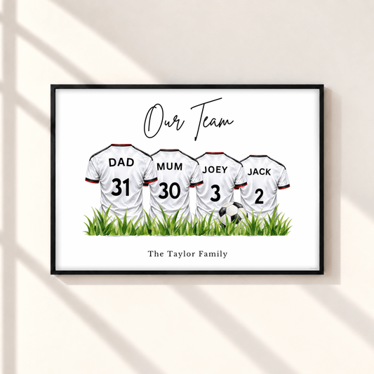 Personalised Fulham inspired family football print with four white football shirts, custom names and numbers, Our Team heading and Taylor Family wording in black frame