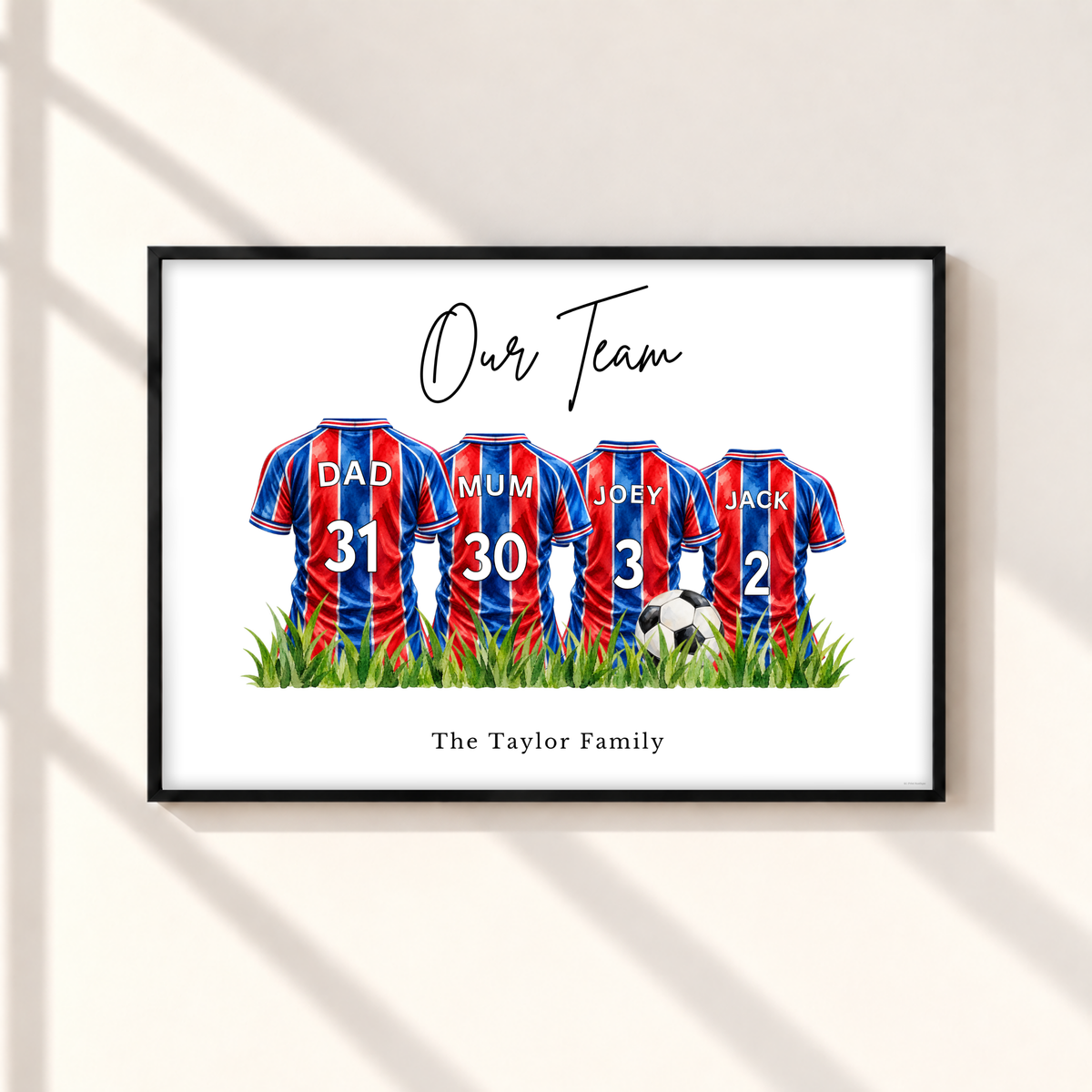 Personalised Crystal Palace inspired family football print with four red and blue striped shirts, custom names and numbers in a black frame