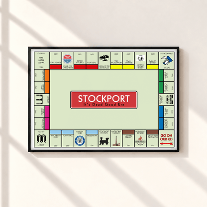 Stockport Monopoly inspired wall art print featuring famous Stockport landmarks and Northern sayings in a black landscape frame on a neutral wall