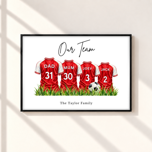 Personalised Arsenal inspired family football print with four red and white custom name and number shirts in black frame.