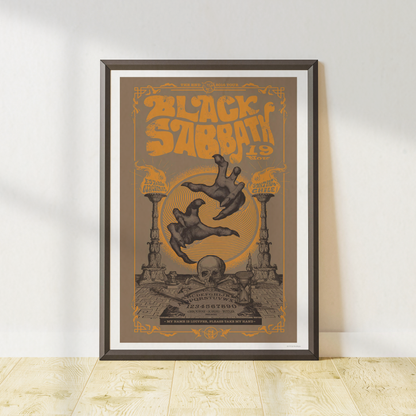 Black Sabbath vintage concert-style poster in a black frame featuring gothic artwork and heavy metal-inspired typography.
