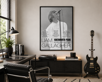 Liam Gallagher Knebworth Park 2022 concert poster displayed in a modern music-inspired home office with guitar, record player and minimalist décor.