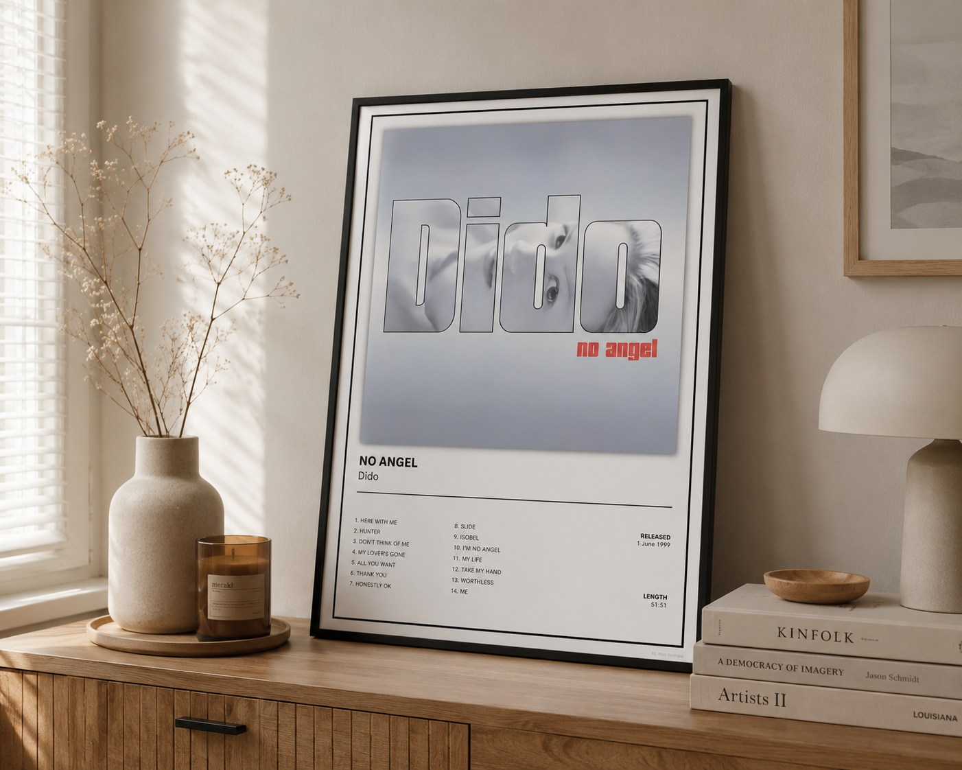 Framed Dido No Angel music poster styled on a contemporary sideboard in a neutral Scandinavian home.