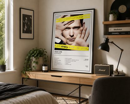 Framed Michael Bublé Crazy Love music poster styled on a modern bedroom desk with minimalist décor and soft natural light.