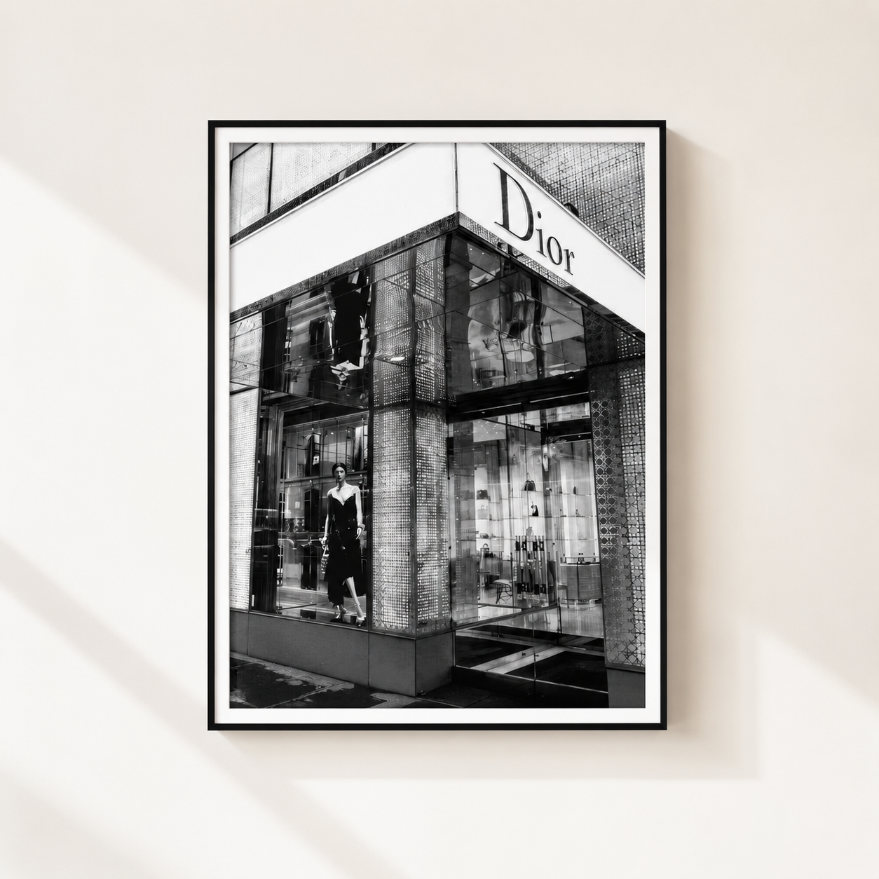 Dior Paris black and white luxury fashion boutique wall art print in a modern minimalist interior.
