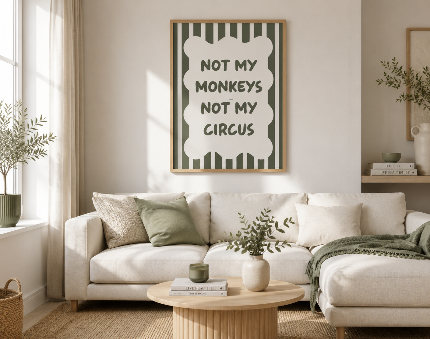 Framed Not My Monkeys Not My Circus sage green typography print displayed above a neutral sofa with Scandinavian-inspired living room styling.