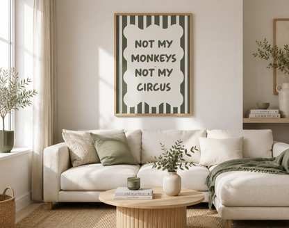 Framed Not My Monkeys Not My Circus sage green typography print displayed above a neutral sofa with Scandinavian-inspired living room styling.