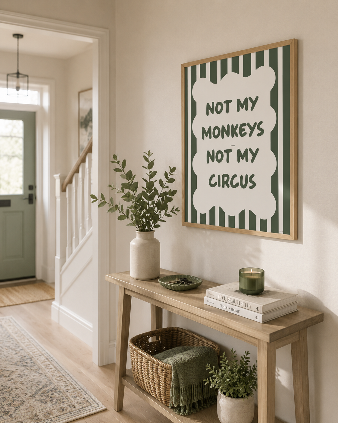Framed Not My Monkeys Not My Circus wall art styled in a bright neutral hallway with light oak furniture and sage green accessories.