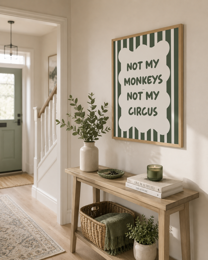 Framed Not My Monkeys Not My Circus wall art styled in a bright neutral hallway with light oak furniture and sage green accessories.