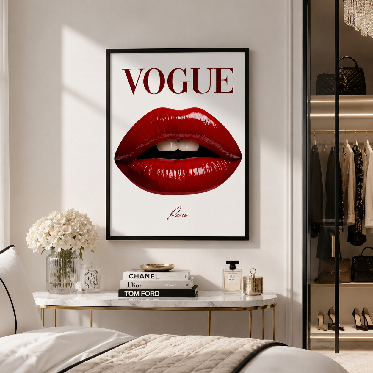 A framed wall art print featuring a large pair of glossy red lips with the word 'VOGUE' above and 'Pierpa' below, displayed in a styled bedroom above a console table with books and flowers.