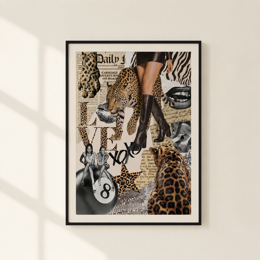 A framed art print featuring a collage of leopard and zebra patterns, vintage newspaper text, a black-and-white portrait, and a leopard cub, hung on a light beige wall with soft window shadows.