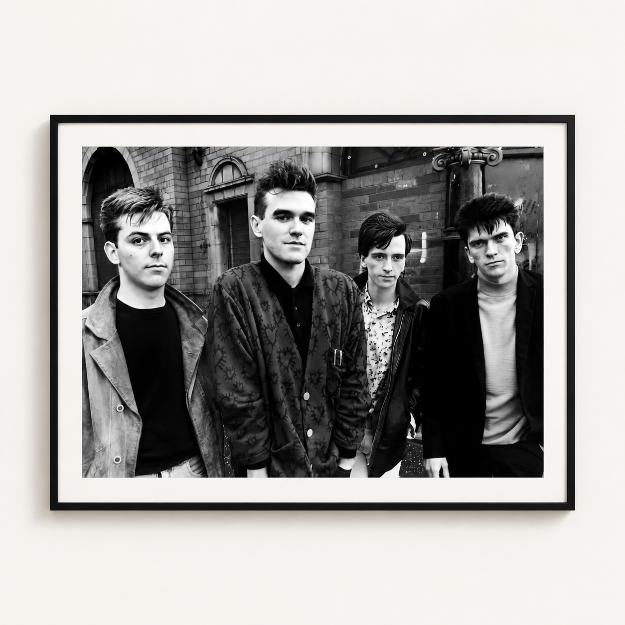 The Smiths black and white band photography print displayed in a modern black frame with white mount.