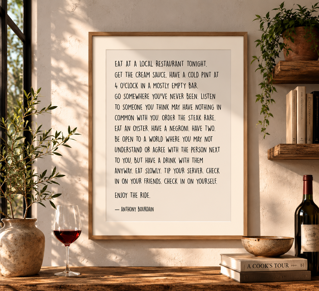 Modern kitchen and dining room typography poster inspired by Anthony Bourdain and his love of food, travel and adventure.