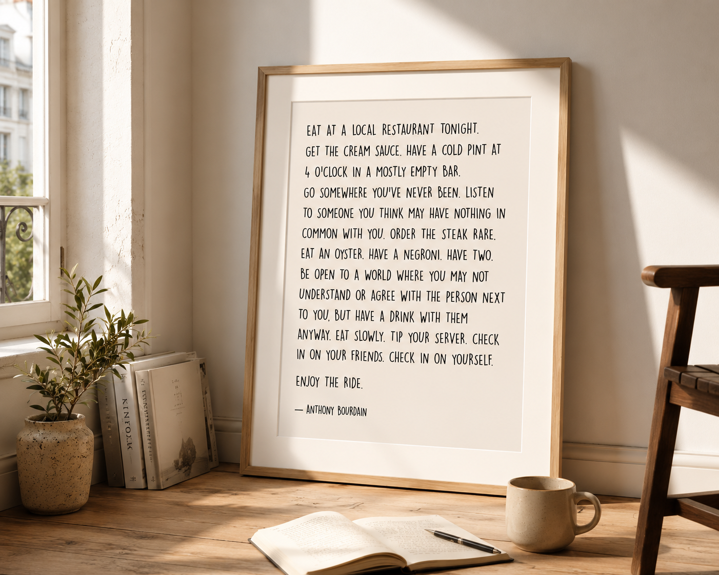 Minimalist Anthony Bourdain wall art featuring inspirational food and travel quote in handwritten typography.