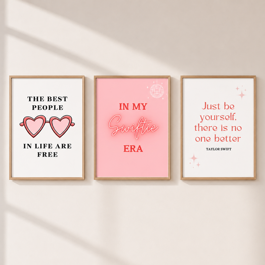 Pink Swiftie-inspired wall art set with three preppy coquette bedroom prints in light oak frames.