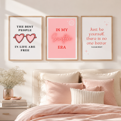 Modern pink typography gallery wall featuring Swiftie-inspired bedroom décor and quote prints.