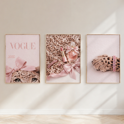 Luxury pink leopard Vogue wall art set in thin champagne-beige frames above elegant neutral console table