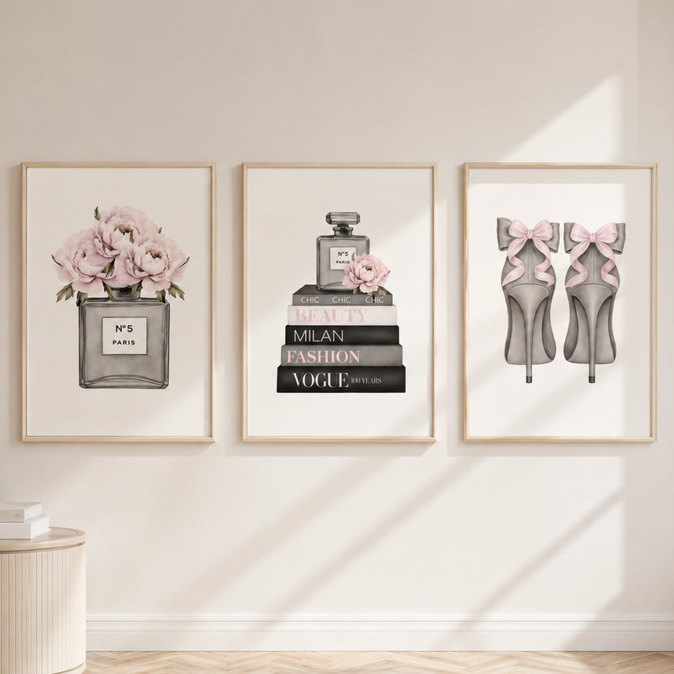 Luxury fashion wall art set featuring perfume bottle, fashion books and pink bow heels in satin champagne frames.