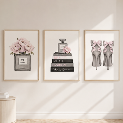 Luxury fashion wall art set featuring perfume bottle, fashion books and pink bow heels in satin champagne frames.