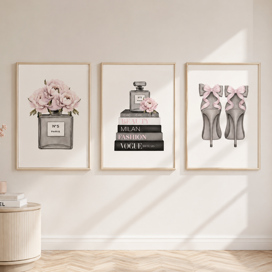 Luxury fashion wall art set featuring perfume bottle, fashion books and pink bow heels in satin champagne frames.