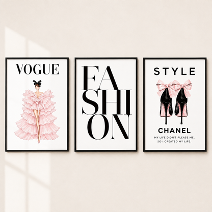 Three framed fashion-themed wall art prints displayed side by side on a light beige wall. The left print reads 'VOGUE' above an illustration of a woman in a pink ruffled dress.