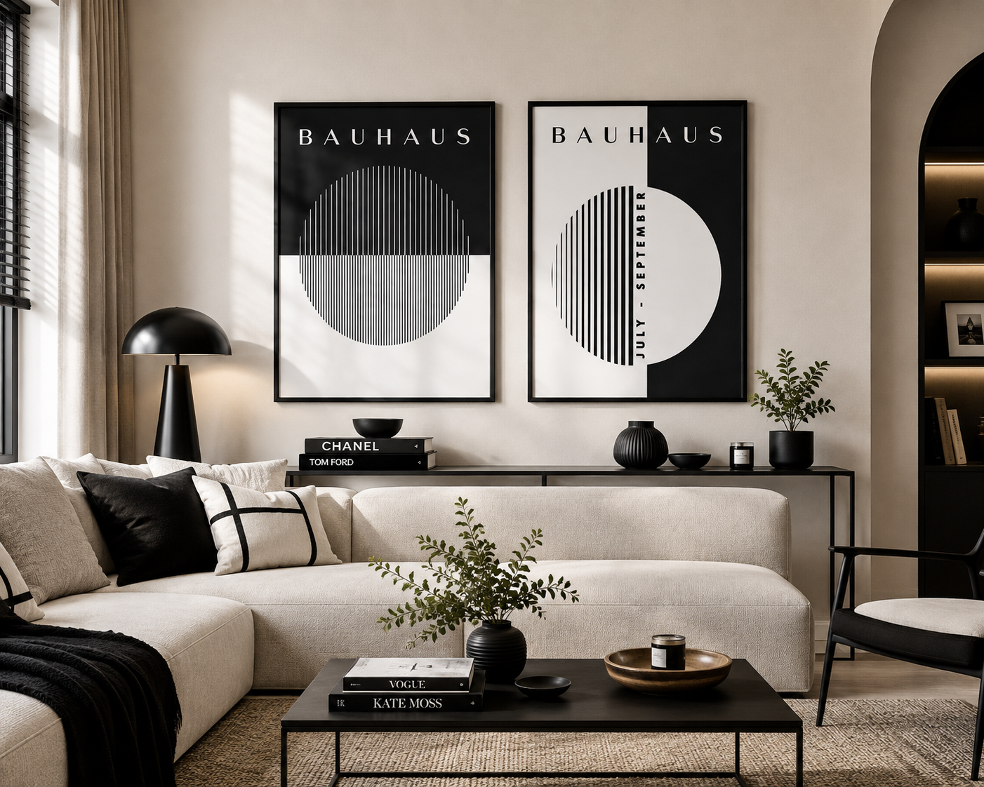 A styled living room featuring two large black and white Bauhaus framed wall art prints hanging above a beige sectional sofa. The prints feature minimalist geometric designs with the word 'BAUHAUS' at the top.