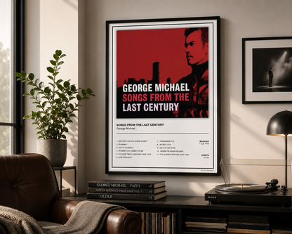 A framed music poster for George Michael's 'Songs from the Last Century' hanging on a wall in a modern living room setting with a leather armchair, plant, and turntable visible.
