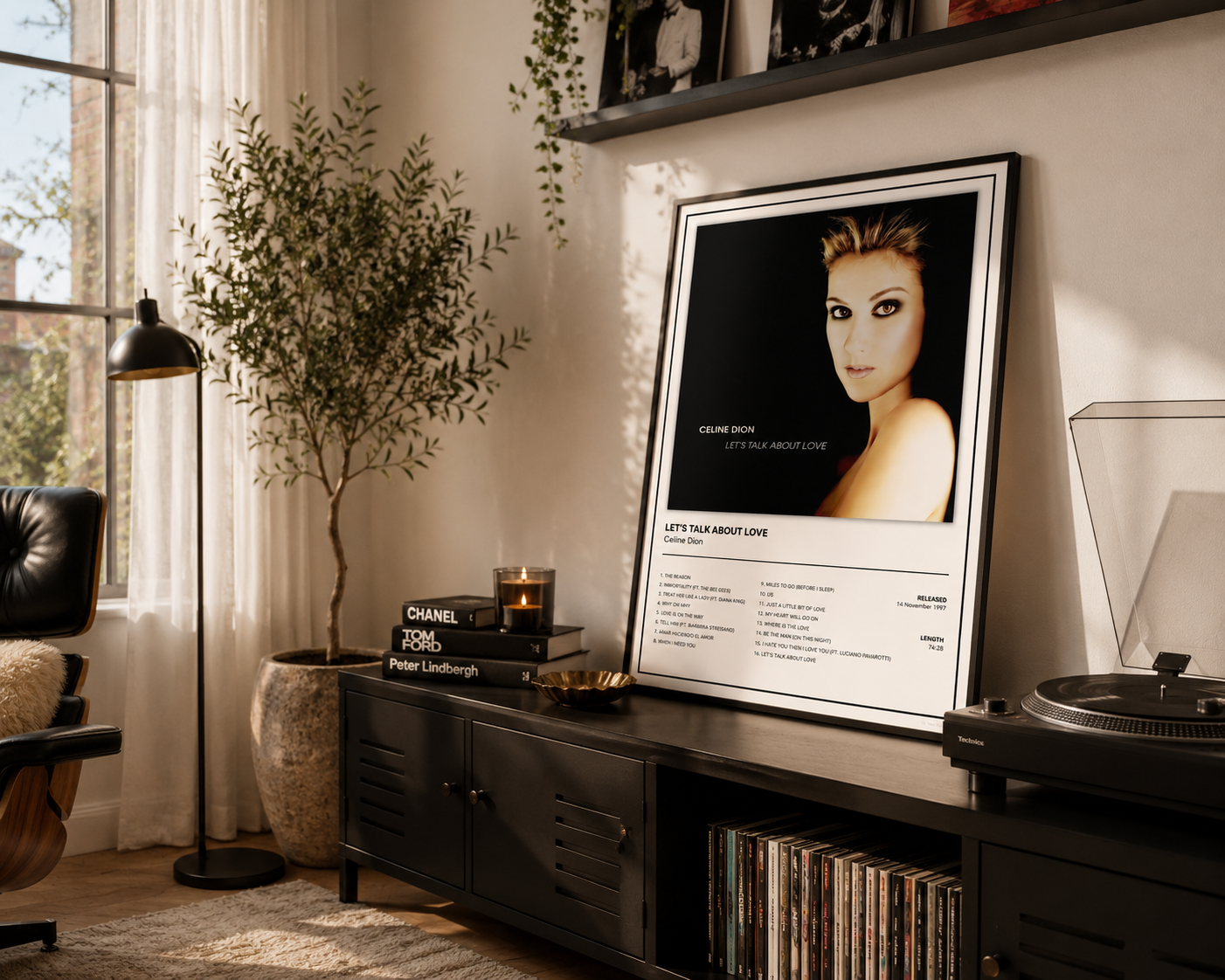 A framed music poster featuring a portrait of Celine Dion and song details, leaning on a dark wooden media console in a styled living room setting.