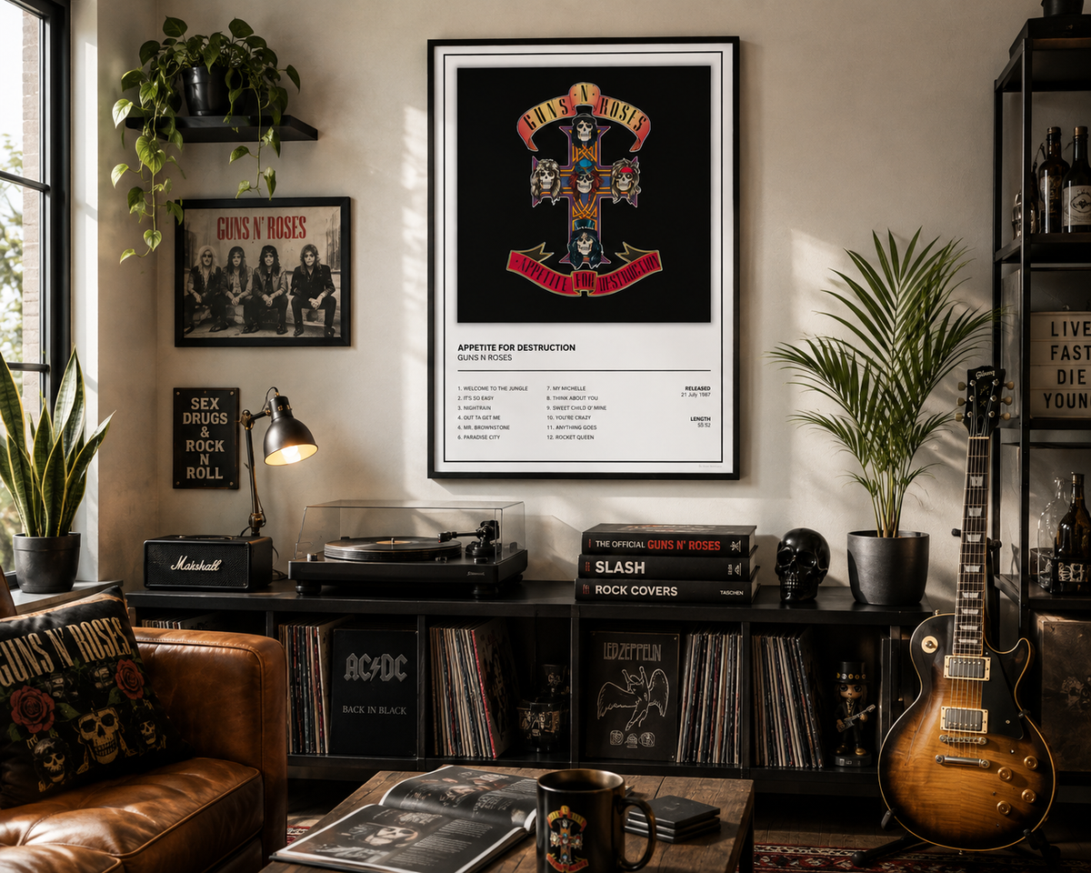A framed Guns N' Roses 'Appetite for Destruction' wall art print hangs in a styled music room with a leather sofa, record player, guitar, plants, and other rock memorabilia.
