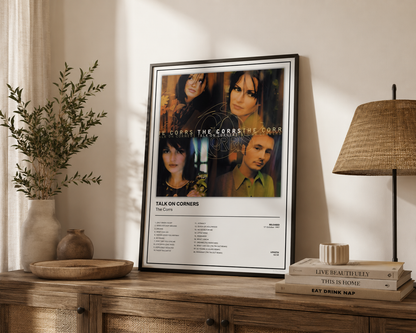 Framed The Corrs Talk On Corners music poster styled on a contemporary sideboard with neutral home decor.
