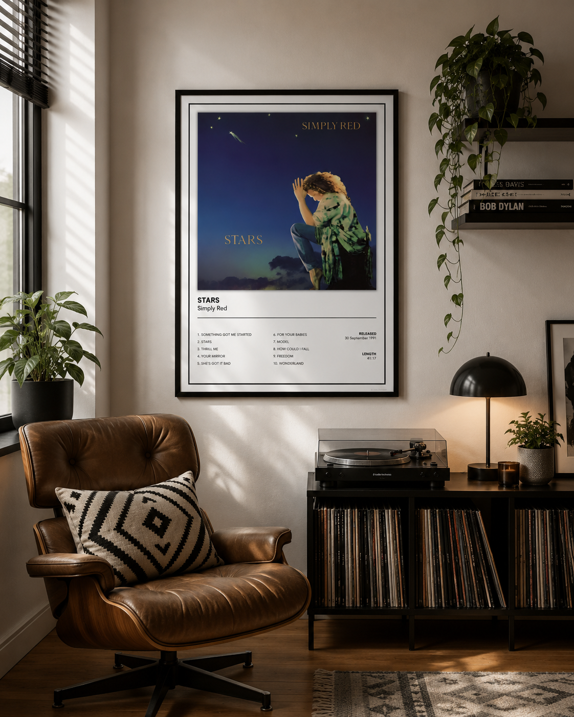 Premium Simply Red Stars album poster print showcased in a stylish bedroom reading nook with a Marshall speaker, record collection, natural wood furniture and soft modern décor.