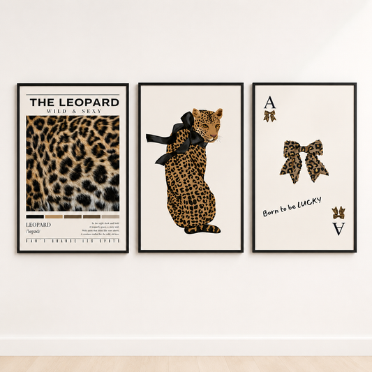 Modern luxury living room featuring coordinated leopard fashion wall art, monochrome animal prints and chic gallery wall décor in warm neutral interiors.