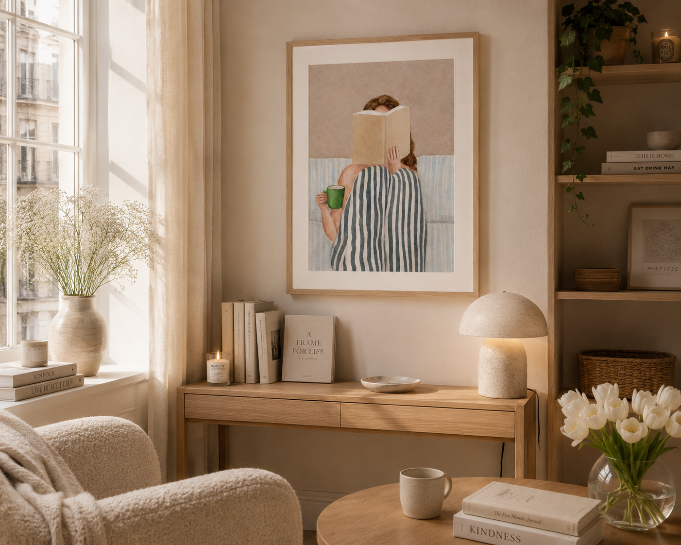 Scandinavian-inspired reading nook print with a woman reading a book under a striped blanket holding a green mug.