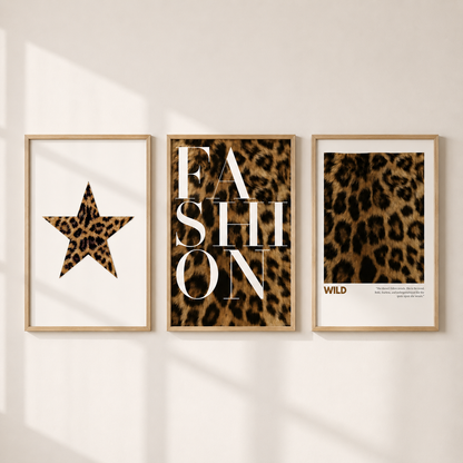 Leopard print wall art set of 3 featuring a leopard star, bold fashion typography and wild animal print poster in light oak frames.