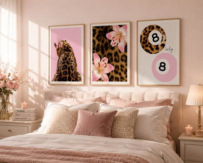 Luxury coquette gallery wall with pink leopard prints, floral artwork and fashion-inspired wall decor for stylish bedrooms.