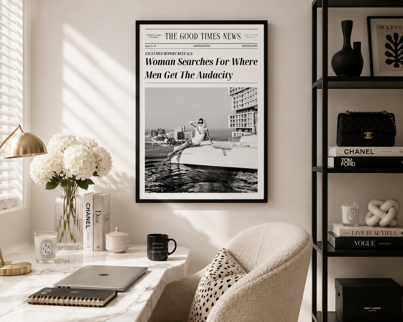 A framed black-and-white newspaper poster hanging on a wall in a styled home office or living space. The poster reads 'Woman Searches For Where Men Get The Audacity' from The Good Times News.