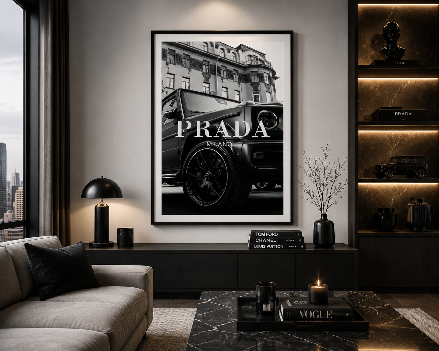 A framed black and white art print of a classic Prada car in a city street scene, displayed on a gray wall in a modern, stylishly decorated living room.