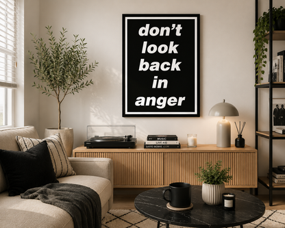 Minimalist Don't Look Back In Anger lyric wall art displayed in a bright modern living room with contemporary neutral décor.