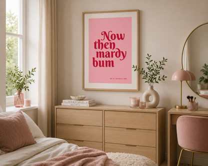Modern blush pink and red Arctic Monkeys lyric wall art displayed in a Scandinavian-style oak frame for contemporary home décor.