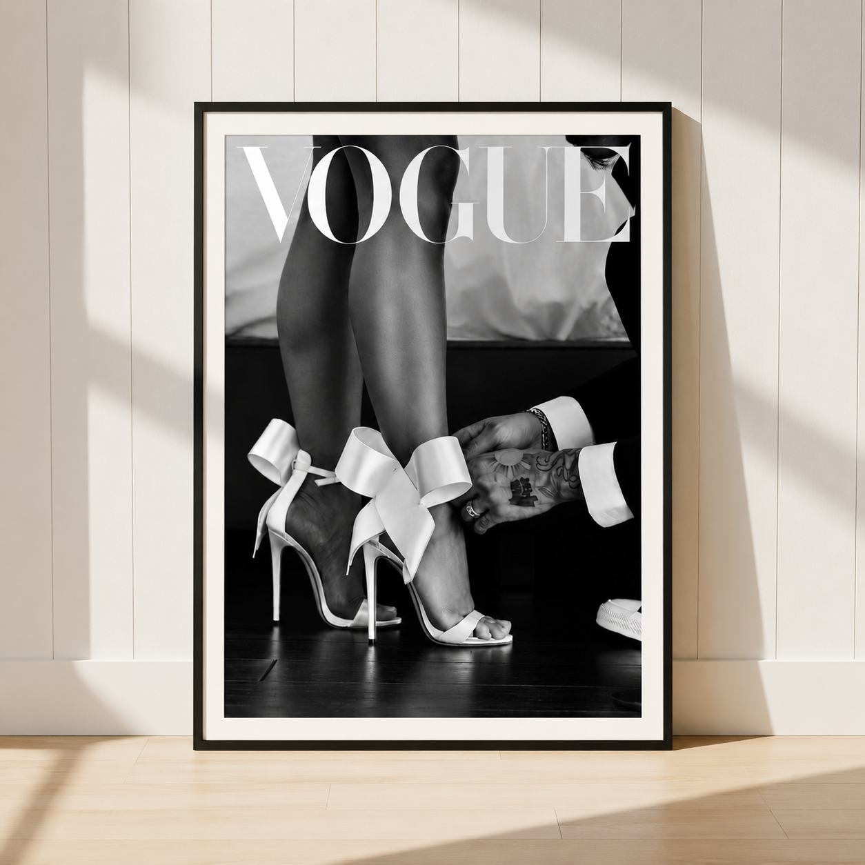Luxury black and white fashion print with editorial photography style in black frame.