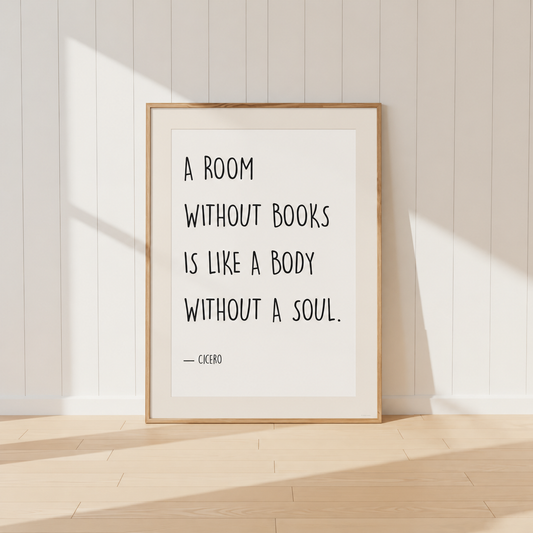 Minimalist Cicero quote print featuring the words "A Room Without Books Is Like A Body Without A Soul" in black typography, finished with a soft neutral mount and light oak frame, perfect for home libraries and reading rooms.