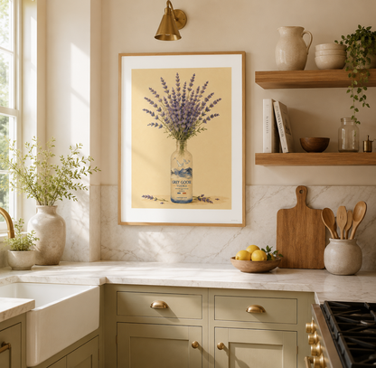 Botanical lavender print with soft cream background and delicate purple blooms displayed in a Grey Goose vodka bottle. Ideal wall art for farmhouse kitchens, dining rooms and cottagecore interiors.