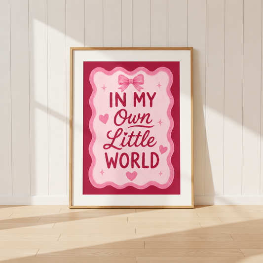In My Own Little World pink coquette wall art print featuring feminine typography, bow details and heart illustrations.