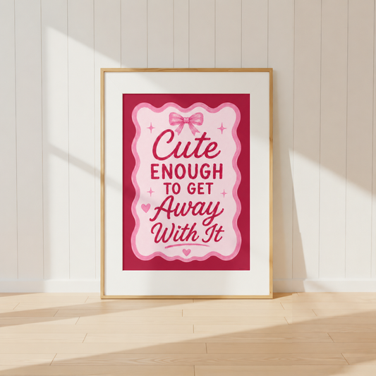 Cute Enough To Get Away With It pink coquette wall art print featuring bow details and feminine typography in a light oak frame.