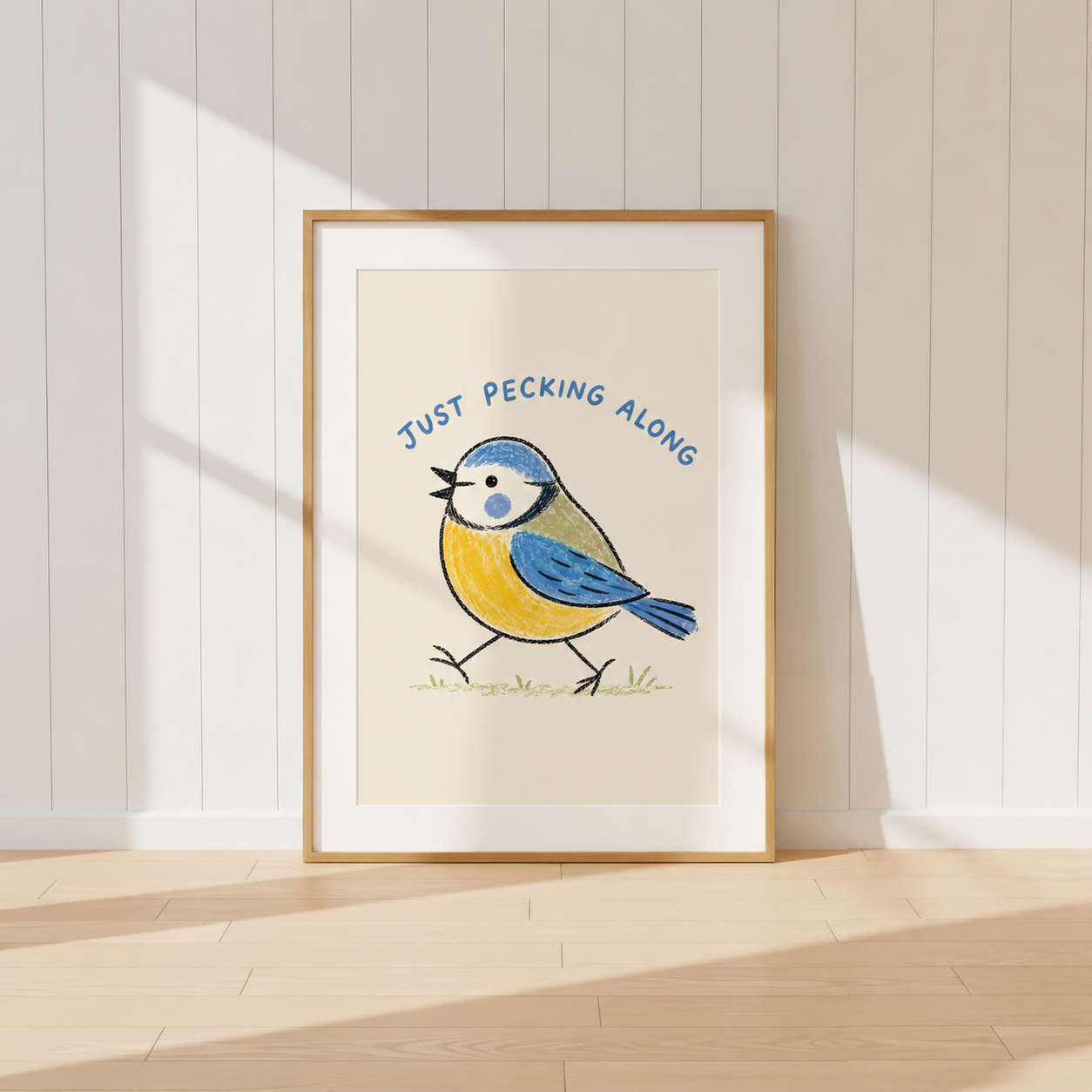 Blue Tit bird wall art with Just Pecking Along quote in light oak frame