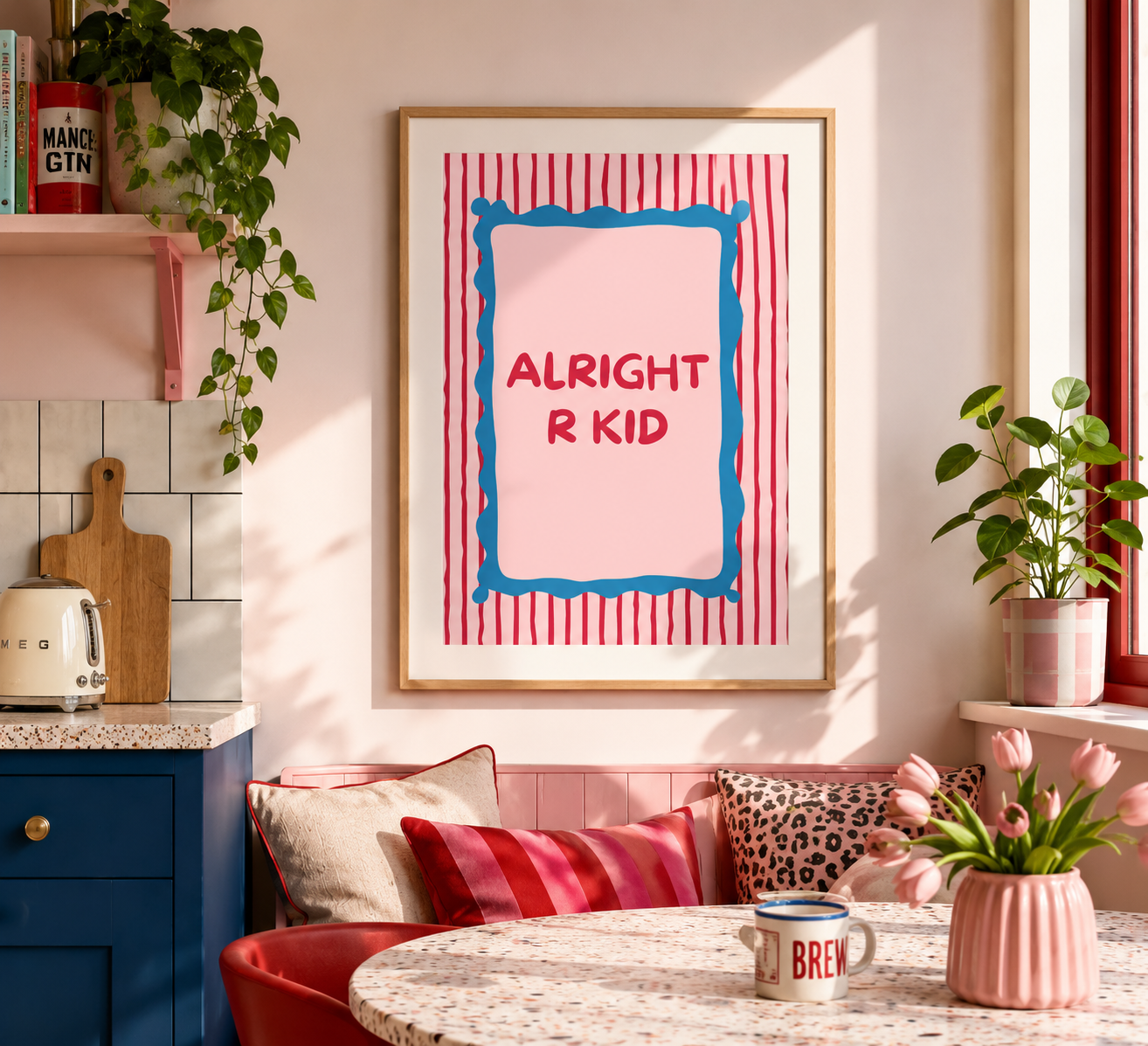 Manc saying wall art print in pink, red and blue colours displayed in a light oak frame.