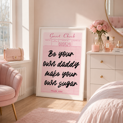Decorative pink sign with text in a stylish room with a mirror, flowers, and a chair.