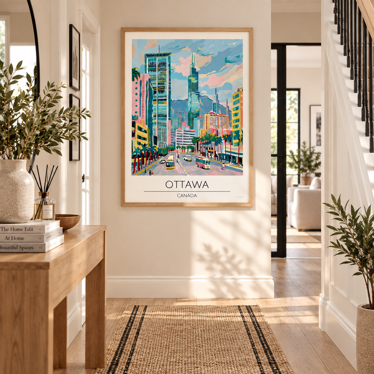A framed travel poster of Ottawa, Canada, hanging on a beige wall in a bright, modern hallway with plants and a wooden console table.