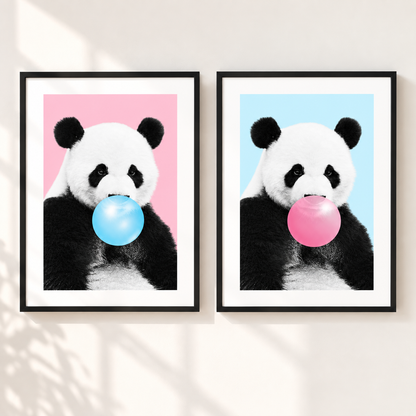 Two framed panda wall art prints hang side by side on a light wall. Each print shows a black-and-white panda holding a bubblegum bubble: one blue and one pink, against pink and light blue backgrounds respectively.